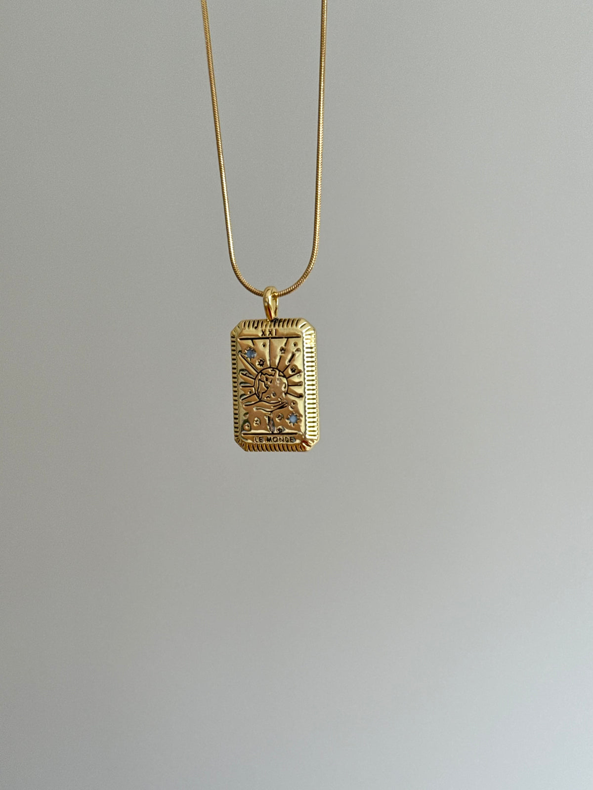 Gold Tone Steel World Medallion Necklace