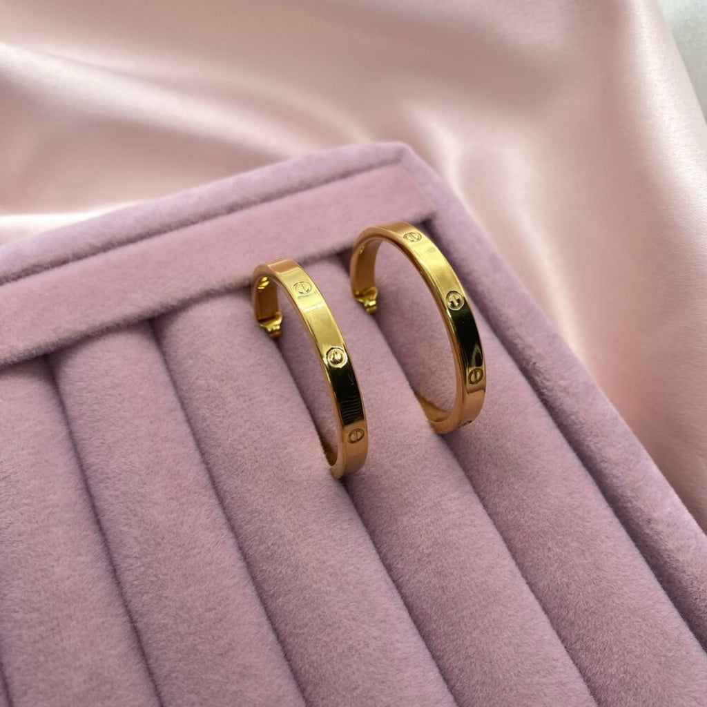 Gold Tone Steel Logo Half Hoop Earrings (3.2 cm)
