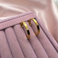 Gold Tone Steel Logo Half Hoop Earrings (3.2 cm)