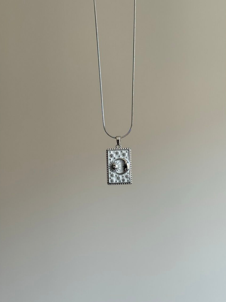 Steel Silver-Colored Sun and Moon Medallion Necklace