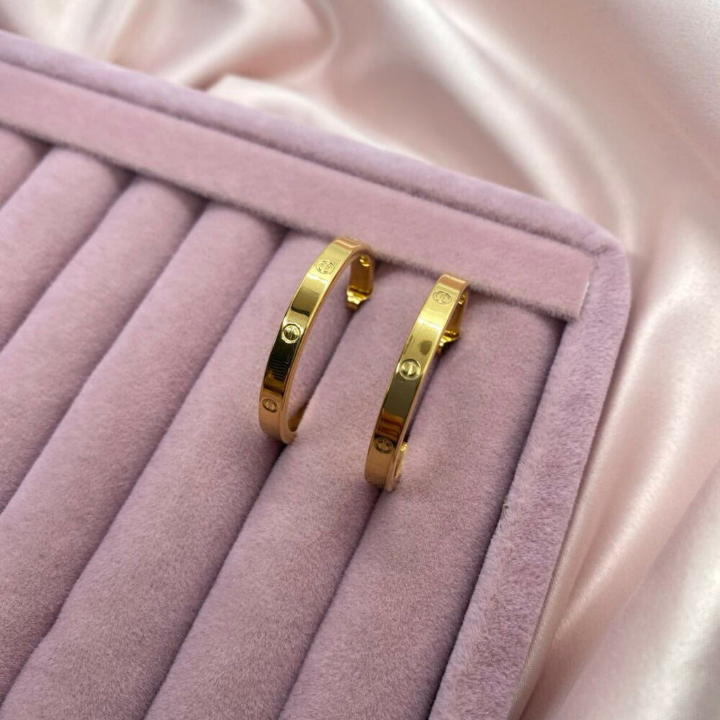 Gold Tone Steel Logo Half Hoop Earrings (3.2 cm)
