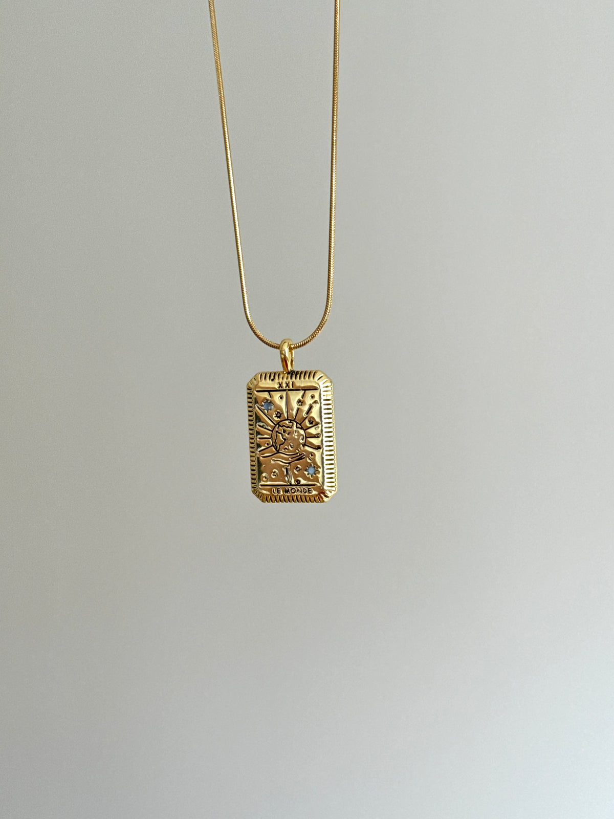 Gold Tone Steel World Medallion Necklace