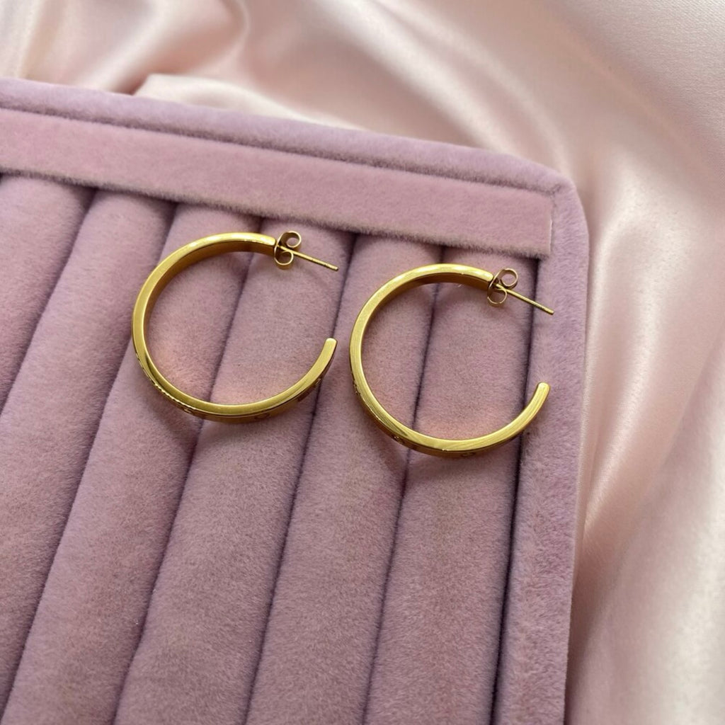 Gold Tone Steel Logo Half Hoop Earrings (3.2 cm)