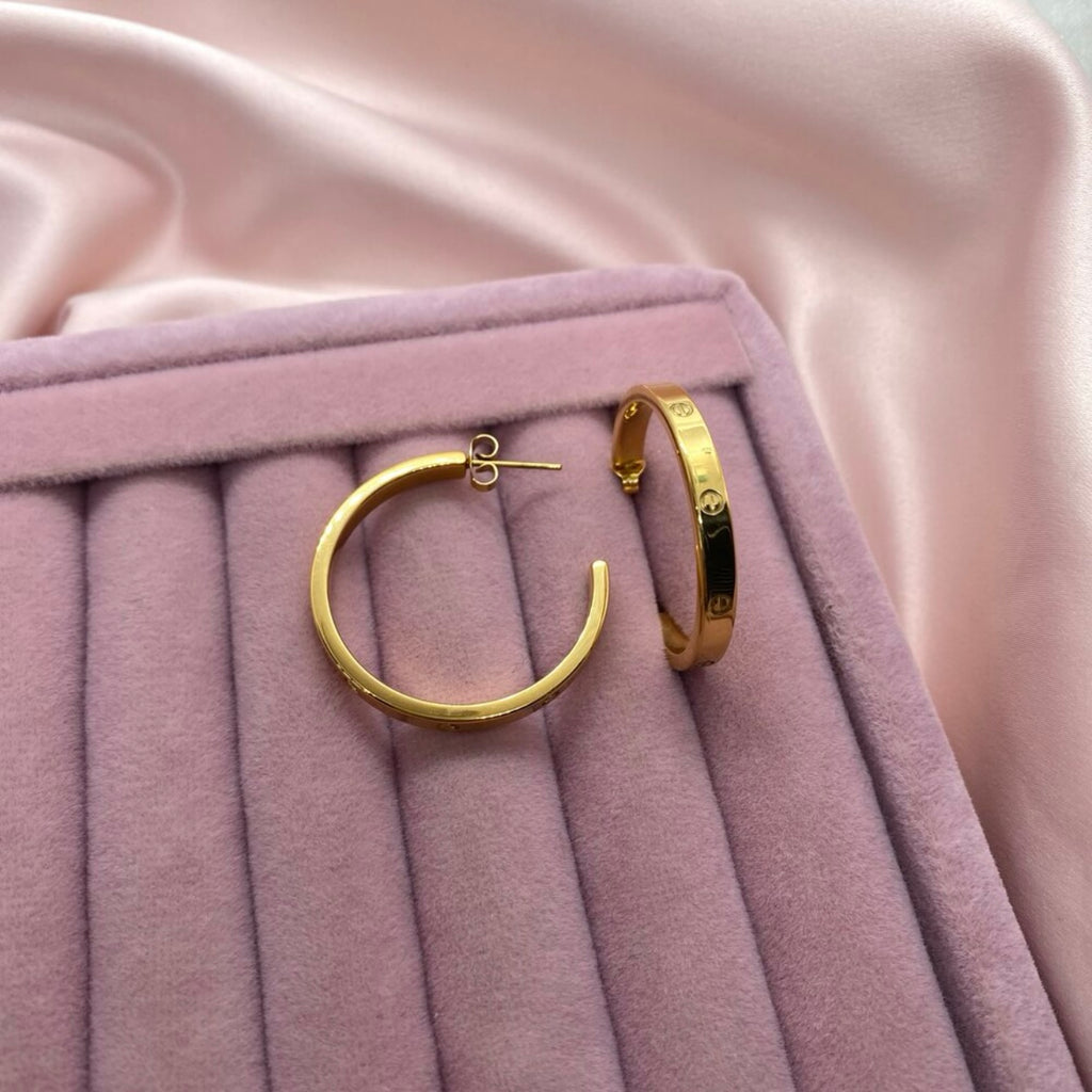 Gold Tone Steel Logo Half Hoop Earrings (3.2 cm)