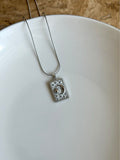 Steel Silver-Colored Sun and Moon Medallion Necklace