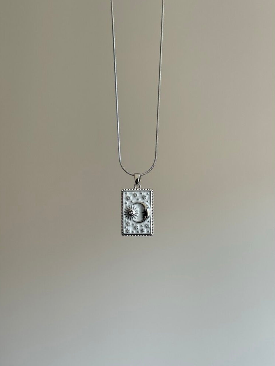 Steel Silver-Colored Sun and Moon Medallion Necklace